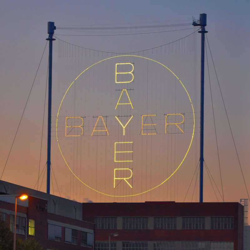 Bayer cross logo illuminated